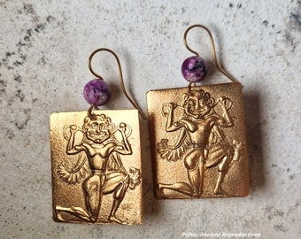 Himera plaque reproduction earrings depicting the Gorgon. Craftsmanship.