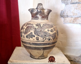 Reproduction of Etruscan Corinthian black-figure Oinochoe vase. Height 22cm.