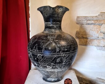 Reproduction of a graffitied Oinochoe vase in Etruscan Bucchero, height 30 cm.