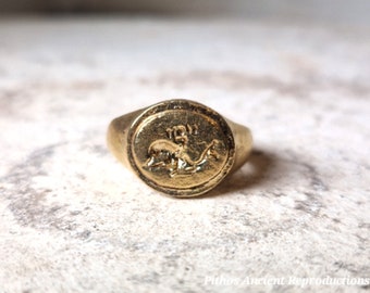 Antique style dolphin ring, made entirely by hand. Brass material, adjustable pinky size.