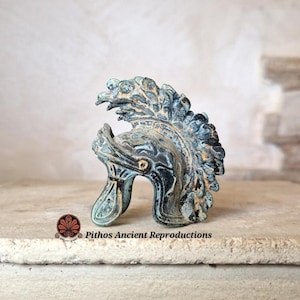 Reproduction of a Roman helmet in bronze.