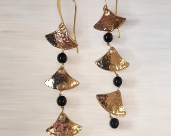 Antique style earrings with three dangling onyx stones. Craftsmanship, Nickel free.