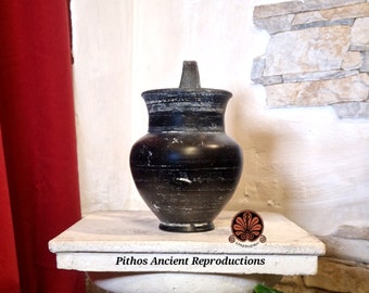 Reproduction of Etruscan Kyathos vase in bucchero. Height 16.5 cm.