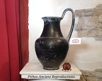Reproduction of Etruscan Olpe vase in bucchero. Height 23 cm.