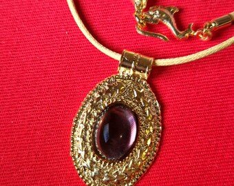 Antique style necklace with handcrafted pendant with leaf decoration and set amethyst stone.