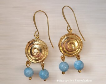 Antique style earrings with two dangling turquoise stones. Nickel free.