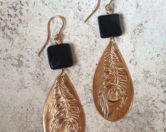 Feather earrings with onyx stone, handcrafted. Brass material with 24k gold plating.