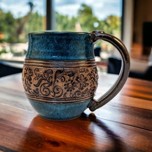 Floral stamped mug in power turquoise