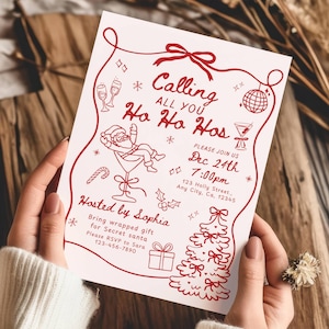 Puede incluir: Una invitación a una fiesta navideña con ilustraciones rojas sobre un fondo crema. El texto dice "Calling All You Ho Ho Hos" e incluye la fecha, hora y lugar. La invitación es sostenida por una persona, con un fondo de madera.
