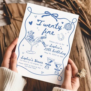 May include: A blue and white birthday party invitation with a cartoon illustration of a woman in a cowboy hat and boots holding a martini glass. The text on the invitation reads "I wenty fine" and "Sophia's 25th birthday".