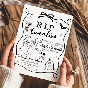 May include: A black and white invitation card with the text "R.I.P twenties" and event details. The card features illustrations of a cocktail, a ghost, a bat, a skull, and a tombstone. The card is held by a person.