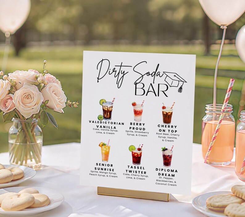 May include: A white sign with the words "Dirty Soda Bar" in elegant script, featuring illustrations of various soda concoctions. The sign includes drink names like "Valedictorian Vanilla" and "Cherry on Top."