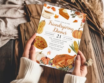 May include: A white Friendsgiving dinner invitation card featuring watercolor illustrations of a roasted turkey, pumpkin pie, squash, corn, and autumn leaves. The text reads: Please join us for Friendsgiving Dinner, November 21 at 4:00PM, The Johnson Home.