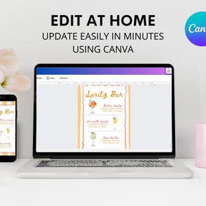 May include: A laptop and smartphone display a Spritz Bar menu template. The laptop screen shows the menu with orange and yellow accents, and the text "EDIT AT HOME UPDATE EASILY IN MINUTES USING CANVA". A pink mug and flowers are also visible.