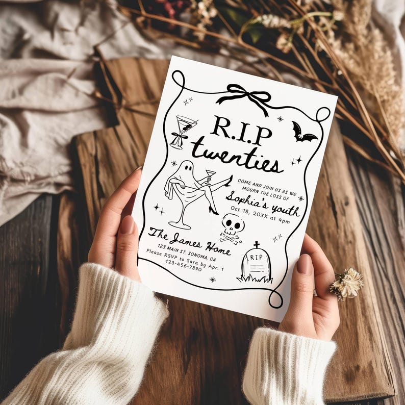 May include: A black and white invitation card with the text "R.I.P twenties" and event details. The card features illustrations of a cocktail, a ghost, a bat, a skull, and a tombstone. The card is held by a person.
