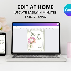 May include: A laptop and smartphone display a "Flower Bar" design with a bouquet illustration. The text "EDIT AT HOME, UPDATE EASILY IN MINUTES USING CANVA" is at the top. A pink mug and flowers are also in the image.