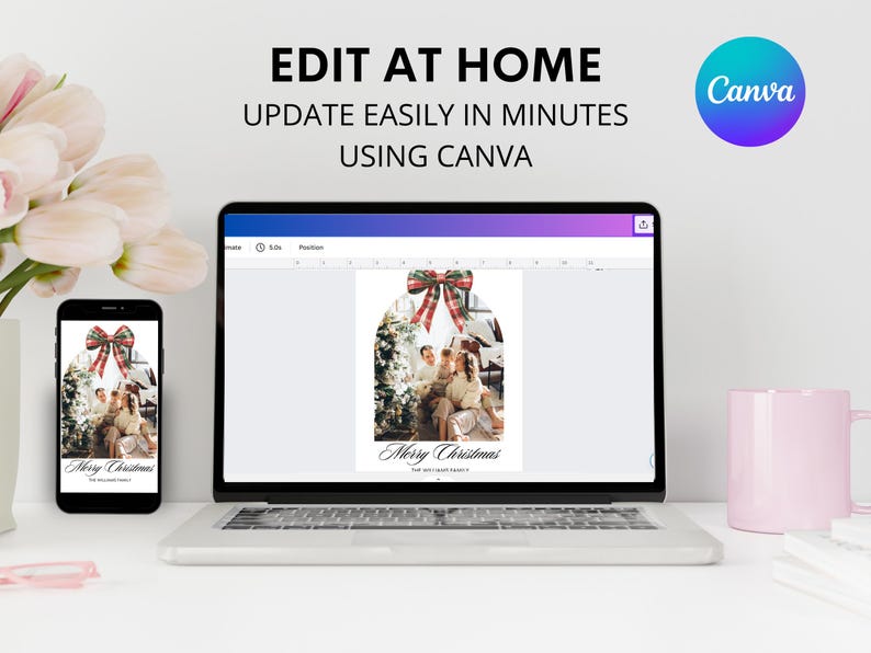 May include: A laptop computer with a screen displaying a Christmas card design in Canva. The card features a family photo with a red and black plaid bow. The text on the card reads "Merry Christmas".