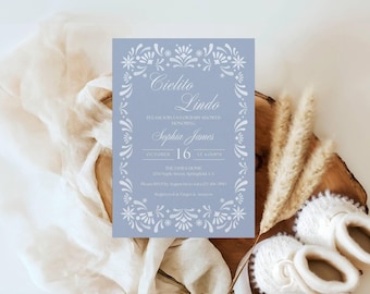 May include: A rectangular light blue invitation card featuring a white decorative floral border and the text Cielito Lindo, Please join us for a baby shower honoring Sophia James, October 16 at 4:00 PM, The James Home, 1234 Maple Street, Springfield, CA.