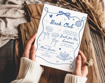 May include: A white rectangular invitation card with blue line art featuring the text Book Club, Just for the Summer, and event details. The design includes illustrations of two stemmed glasses, a disco ball, and an open book with flowers.