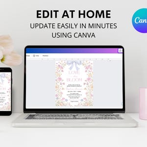 May include: A laptop, smartphone, and pink mug are on a white desk. The laptop and smartphone display a floral invitation design with the text "Love in Bloom." The image includes the text "Edit at Home, Update Easily in Minutes Using Canva."