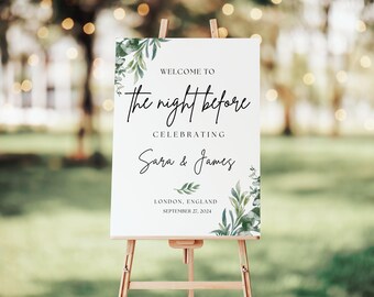 May include: A white rectangular welcome sign on a wooden easel featuring green watercolor eucalyptus leaves. The text reads: WELCOME TO the night before CELEBRATING Sara & James LONDON, ENGLAND SEPTEMBER 27, 2024 in black serif and script fonts.