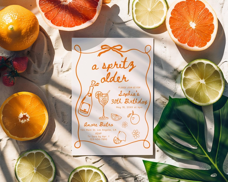 May include: A white invitation card with orange text and illustrations, surrounded by citrus fruits and a green leaf. The card reads "a spritz older" and invites guests to Sophia's 30th birthday.