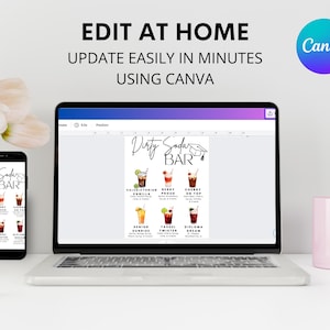 May include: A laptop and smartphone display a "Dirty Soda Bar" menu with various cocktail illustrations. The text "Edit at Home, Update Easily in Minutes Using Canva" is displayed above the laptop. A pink mug and flowers are also in the image.