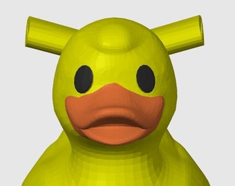 Puede incluir: Un pato de goma amarillo con un pico largo y delgado y dos cuernos en la parte superior de su cabeza. El pato tiene ojos negros y un pico naranja. El pato tiene las palabras "Carnival Valor" escritas en su pecho en rojo.