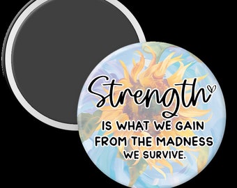 Strength is what we gain - 2.25in Pinback Button, Magnet or Keychain