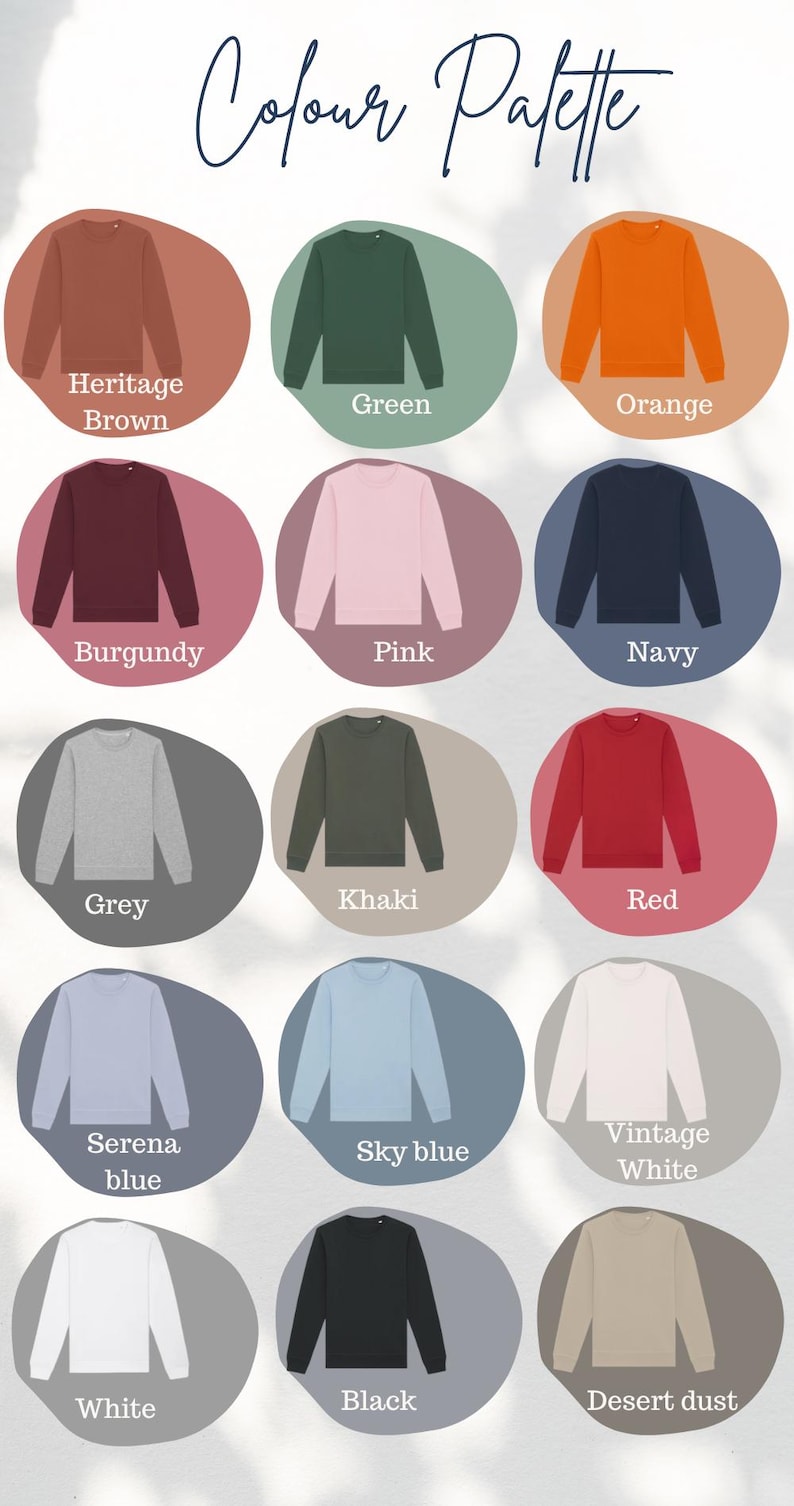 May include: A color palette graphic featuring various crewneck sweatshirts in a range of colors, including Heritage Brown, Green, Orange, Burgundy, Pink, Navy, Grey, Khaki, Red, Serena Blue, Sky Blue, Vintage White, White, Black, and Desert Dust. The text "Colour Palette" is at the top.