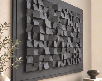 May include: A rectangular wall art piece featuring a grid of numerous small, black-stained wooden blocks of varying depths and angles, mounted on a flat, solid black rectangular base, creating a textured, three-dimensional geometric surface.