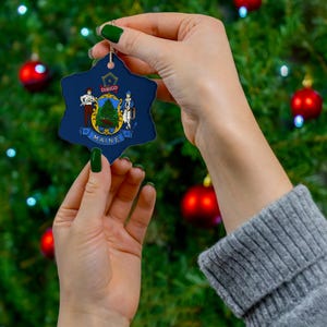 Maine Christmas Ornament - State Flag Inspired Travel Gift, Ceramic Holiday Decoration, Souvenir