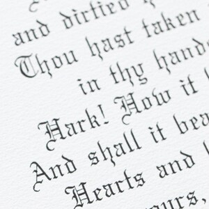 May include: Close-up of a white paper with black gothic script. The text includes phrases like "And with," "dirtied hands," and "Hark! How it." The image showcases a vintage aesthetic, possibly from a book or manuscript.