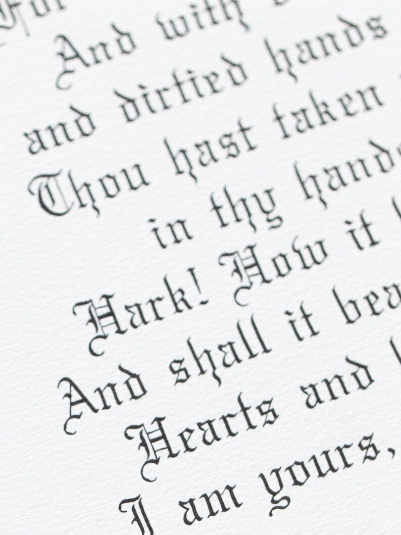 May include: Close-up of a white paper with black gothic script. The text includes phrases like "And with," "dirtied hands," and "Hark! How it." The image showcases a vintage aesthetic, possibly from a book or manuscript.