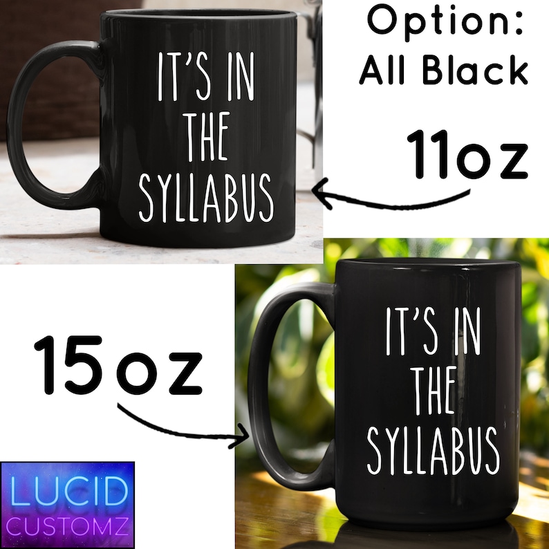 May include: Two black ceramic mugs with white text that reads "It's in the syllabus". The mug on the left is 15 ounces and the mug on the right is 11 ounces.