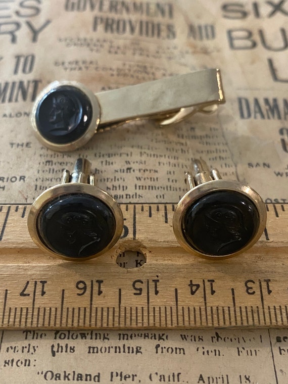 vintage tie tack with matching cuff links.