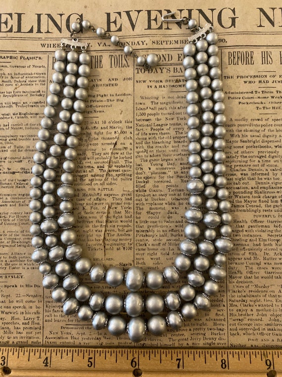 Multi strand faux pearl necklace