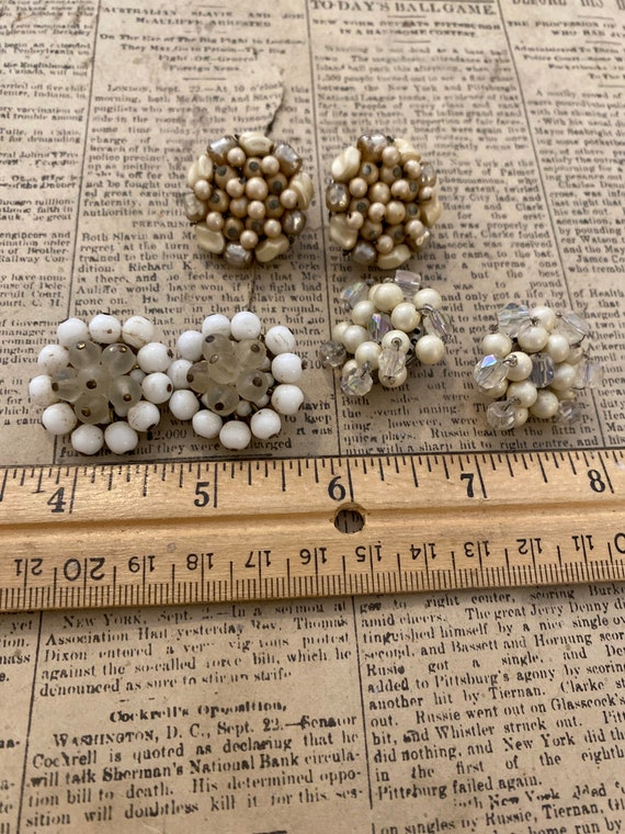 Set of three bead cluster earrings.