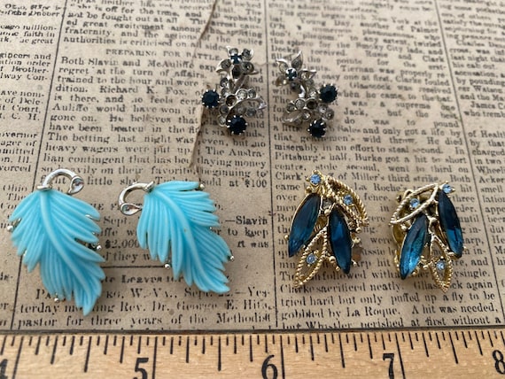 Set of three blue clip back earrings including on… - image 1