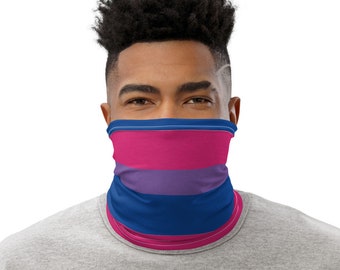 May include: A person wearing a face covering with a blue, purple, and pink striped pattern. The face covering is made of a soft, breathable fabric and is designed to be comfortable to wear.