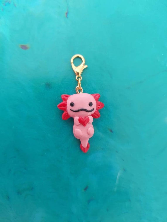 Axolotl made w/ Polymer clay and Cosclay in a bowl with water (resin) and  river rocks for the baby's comfort : r/polymerclay