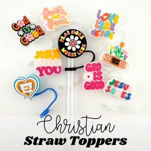 May include: A set of colorful straw toppers with Christian-themed sayings. The toppers feature phrases like "God is Good", "Jesus Saves", "Love Like Jesus", and "Pray More Worry Less".