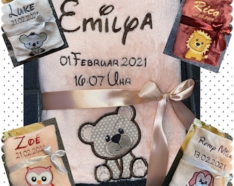 Cuddly soft baby blanket that can be personalized and embroidered with a name, date and appliqué