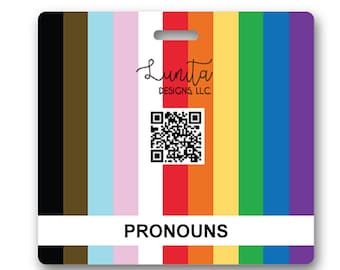 May include: A square pronoun badge with a rainbow stripe design and a QR code. The badge has a white label with the word "PRONOUNS" printed in black.