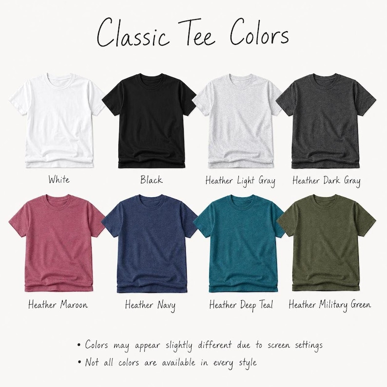 a collection of classic t-shirt colors, including white, black, light gray, dark gray, maroon, navy, deep teal, and military green. The colors may appear slightly different due to screen settings, and not all colors are available in every style.