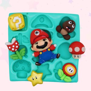 May include: A teal silicone mold featuring various colorful Super Mario Bros. characters and icons. Includes Mario, a question block, a mushroom, a star, and other recognizable elements from the video game series.