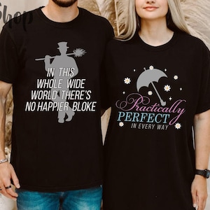 May include: Two black t-shirts with a graphic print. The first shirt features a silhouette of a chimney sweep with the text "In this whole wide world there's no happier bloke". The second shirt features an umbrella with the text "Practically Perfect in every way".