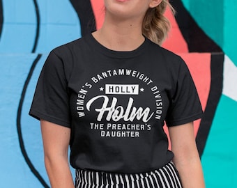 Holly Holm La fille du prédicateur Classic WMMA Fighter porte un t-shirt unisexe