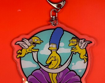 Marge i en snäckskal nyckelring