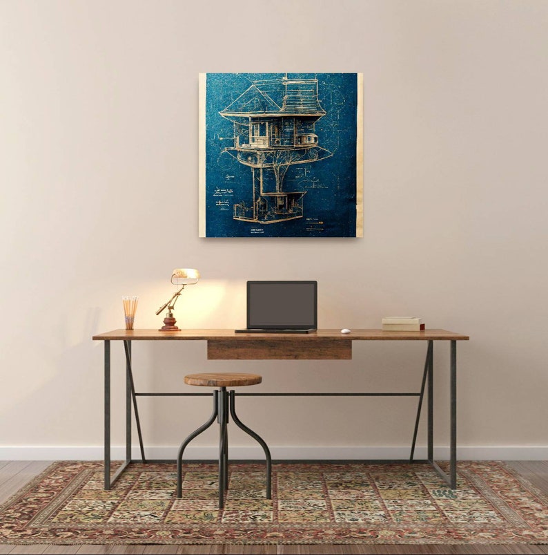 May include: A blueprint style illustration of a treehouse on a blue background. The treehouse has a roof, windows, and a ladder. The illustration is framed and hanging on a wall above a desk with a laptop, lamp, and stool.